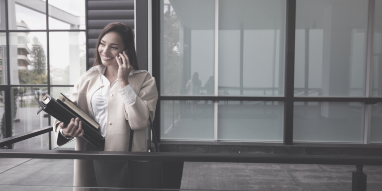 happy business women on phone