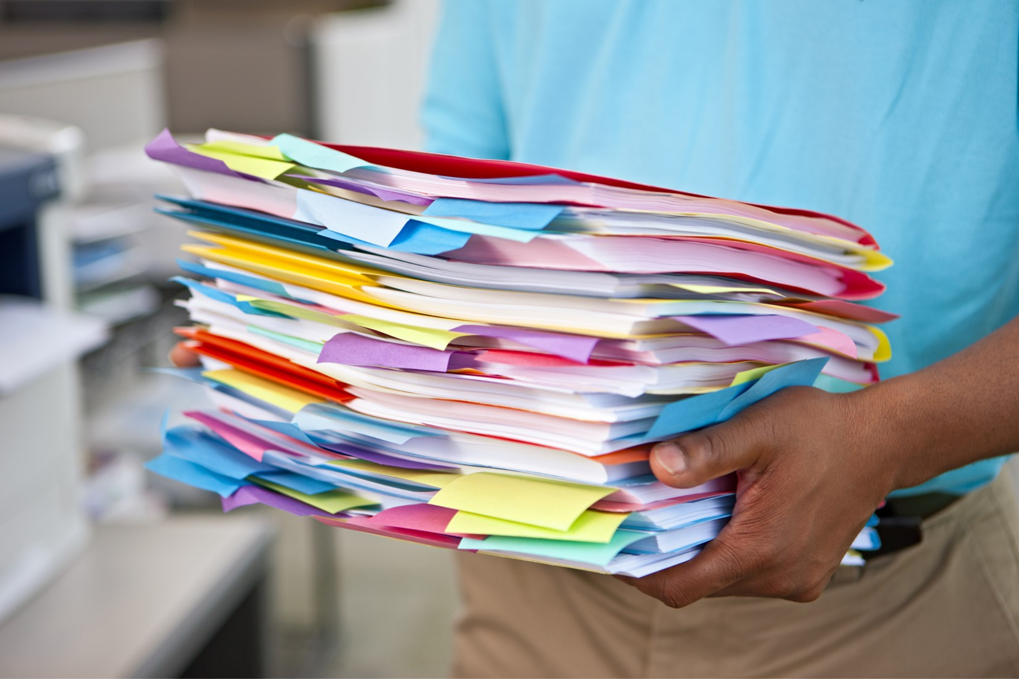 a stack of paper that can be disposed of by scanning