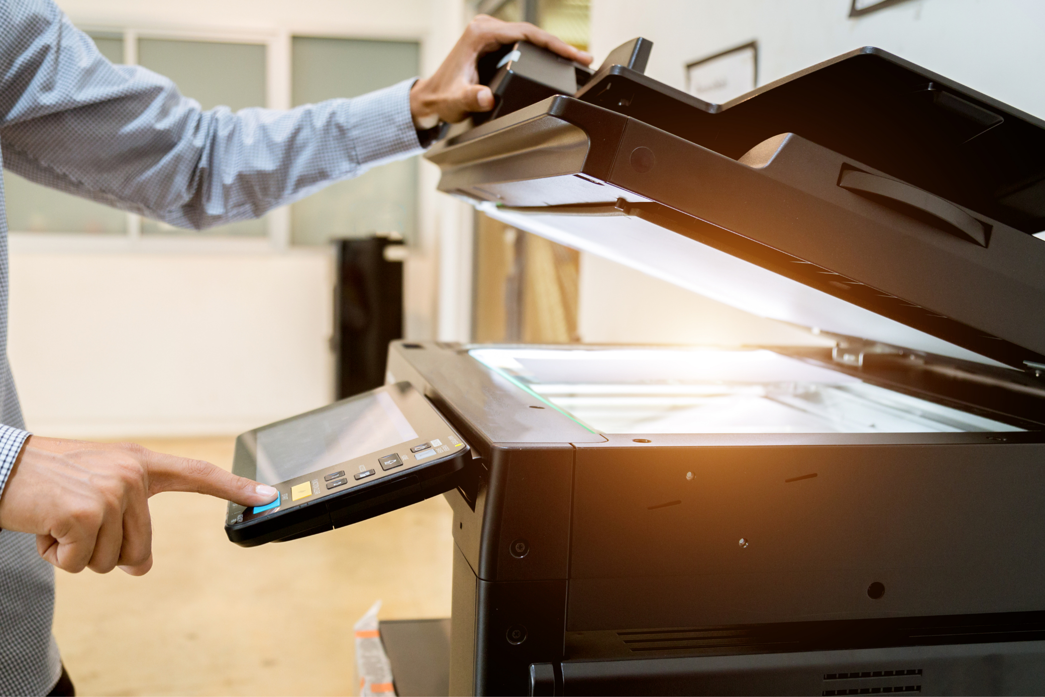 person using a kyocera copier