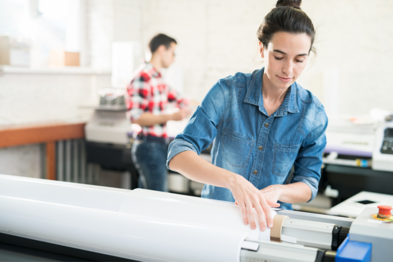 happy workers in wide format printing environment